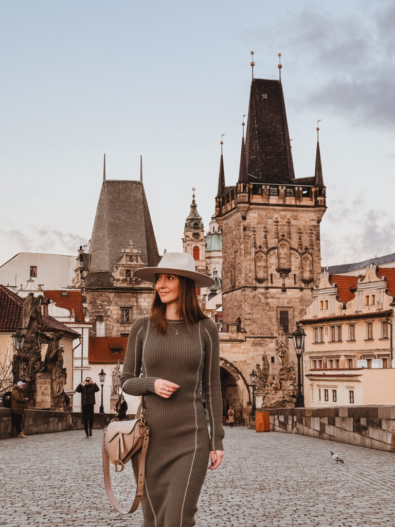Early morning view of Charles Bridge in Prague with historic statues